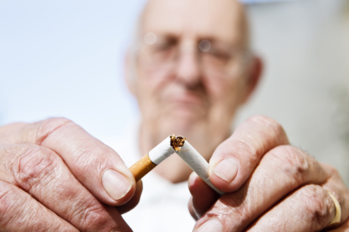 Never too late to stop smoking: old man breaks cigarette